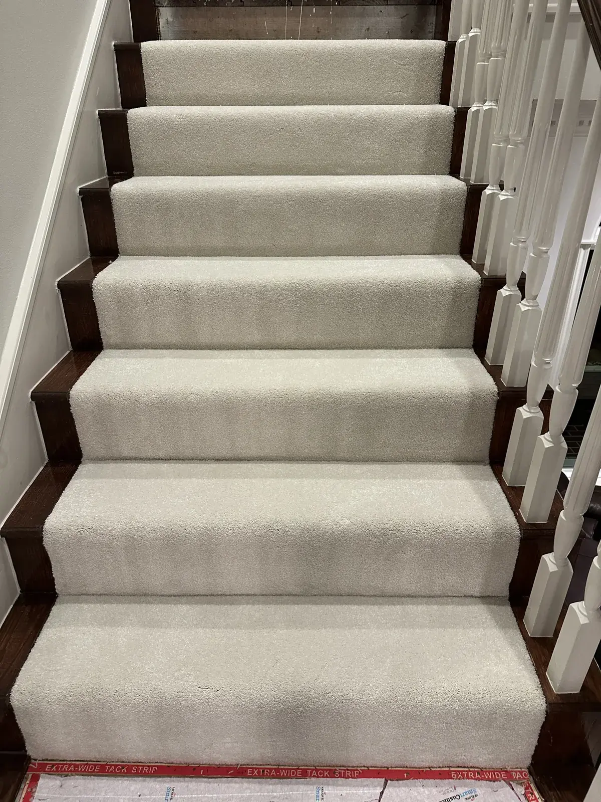 Cream plush carpet on a staircase in The Woodlands, TX