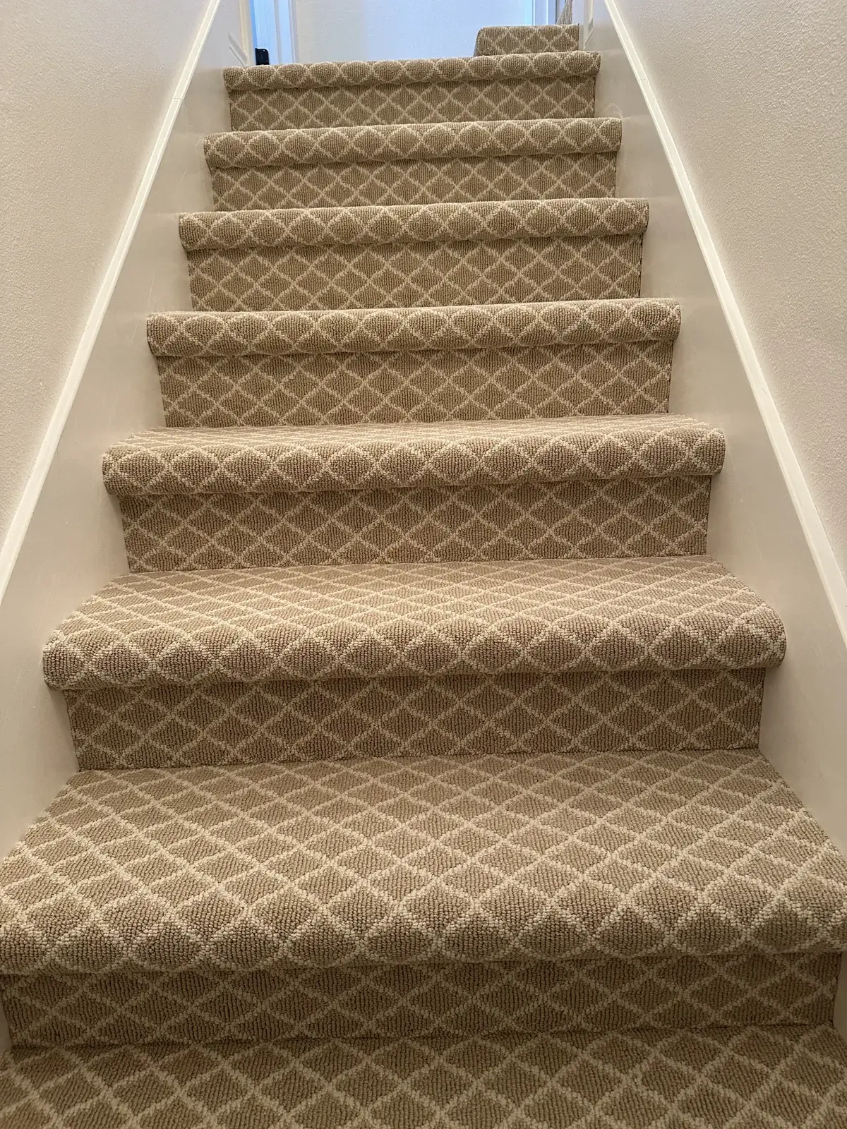 Diamond-pattern stair carpet installed in Spring, TX